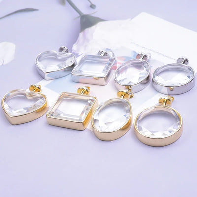 Cheeky Crafter DIY Floating Locket Kit - Assorted empty floating lockets in gold or silver coloured, and either circle, heart, oval, or square shaped.