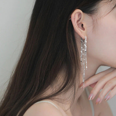 Elena Tassel Chain Lever Back Earrings - Cute little heart-shaped huggies with long dangly silver tassels strung off them.