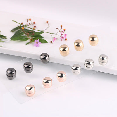 Essentials Magnetic Scarf Pins - A tiny, round magnetic brooch designed to hold together fabric without damaging it, available in gold, silver, black, or rose.