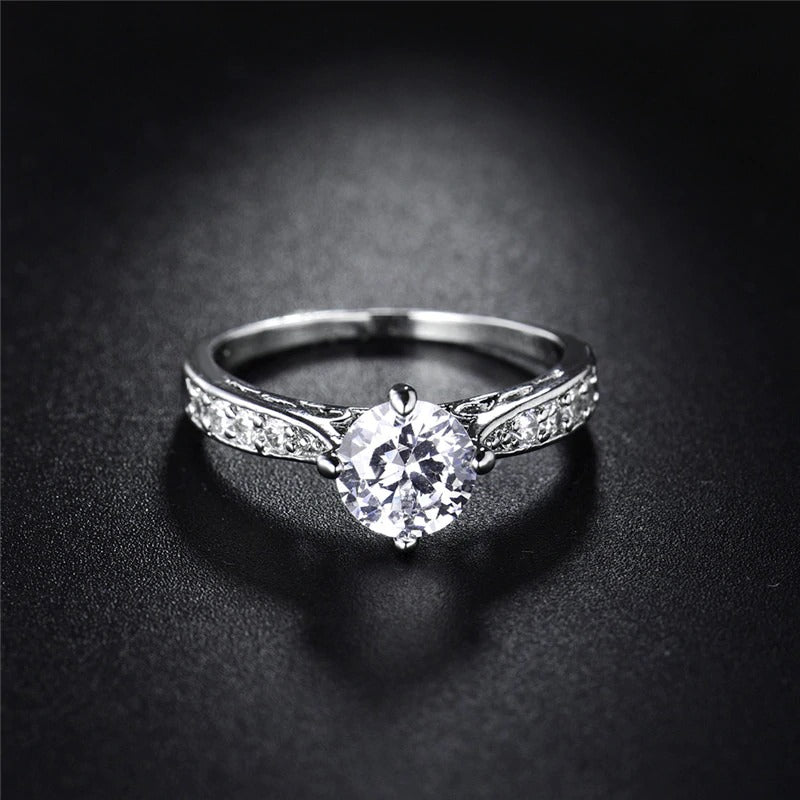 The Eternal Classic Pave Ring - A simple, lovely imitation diamond promise ring with smaller stones on either side. 