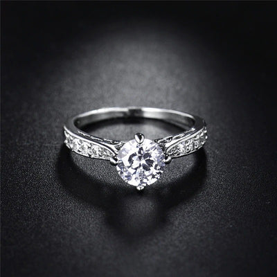 The Eternal Classic Pave Ring - A simple, lovely imitation diamond promise ring with smaller stones on either side.