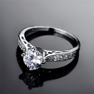 The Eternal Classic Pave Ring - A simple, lovely imitation diamond promise ring with smaller stones on either side.