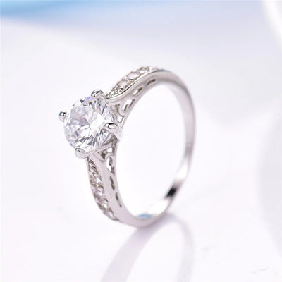 The Eternal Classic Pave Ring - A simple, lovely imitation diamond promise ring with smaller stones on either side.