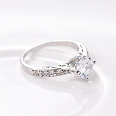 The Eternal Classic Pave Ring - A simple, lovely imitation diamond promise ring with smaller stones on either side.