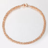 Eudocia Byzantine Weave Bracelet - A delicate rose gold bracelet made from a complicated weave of interlocking rings.