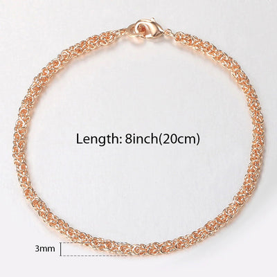 Eudocia Byzantine Weave Bracelet - A delicate rose gold bracelet made from a complicated weave of interlocking rings.