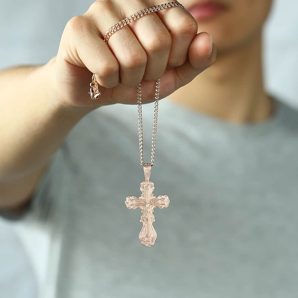 Faith Oversized Ornate Crucifix Necklace - A large, ornately carved rose gold cross on a slim chain.