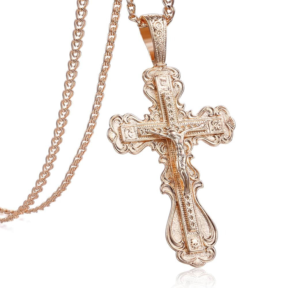 Faith Oversized Ornate Crucifix Necklace - A large, ornately carved rose gold cross on a slim chain.