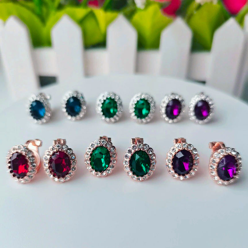 Hailee Entourage Clip Earrings - Ultra-petite, vintage-style clip-on earrings featuring a single coloured stone surrounded by 16 smaller stones.