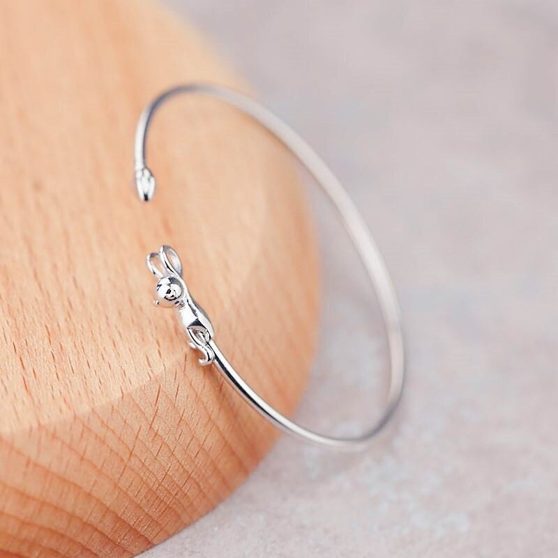Hang In There Kitty Silver Bangle - A simple silver bangle with a cute kitty cat decoration.