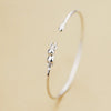 Hang In There Kitty Silver Bangle - A simple silver bangle with a cute kitty cat decoration.