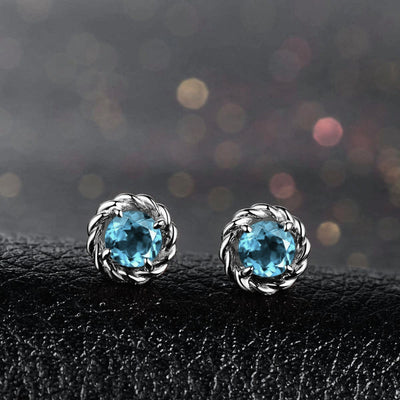 Iris Chromatic Crystal Stud Earrings - Beautiful, delicate little stud earrings featuring a single brightly-coloured topaz surrounded by a wreath of gold or silver toned metal.