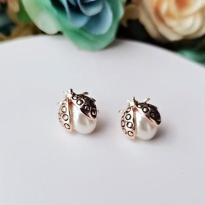 Ladybug Stud Earrings - A cute little pair of stud earrings with a stylised cartoon ladybug.