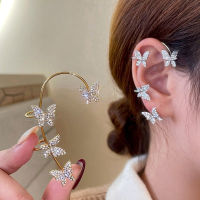 Lana Butterfly Ear Cuff - A sparkly, gemstone-encrusted ear cuff with a butterfly motif.