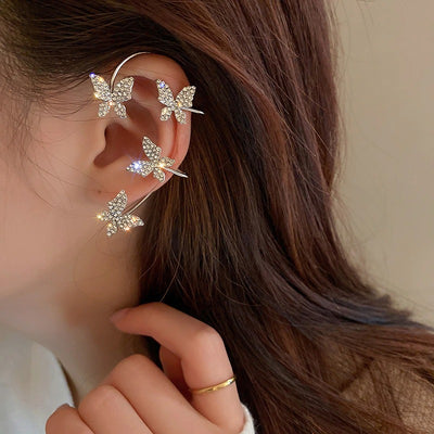 Lana Butterfly Ear Cuff - A sparkly, gemstone-encrusted ear cuff with a butterfly motif.