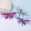 Libelle Dragonfly Brooch - A simple, stylised resin brooch shaped like a child's drawing of a dragonfly.