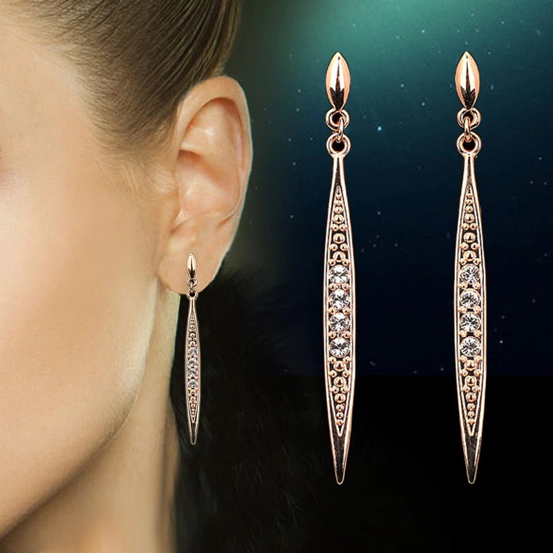 The Marquise's Drop Earrings - Long, delicate gold and platinum earrings with crystals.