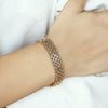 Medea Multi-Layer Rolo Chain Bracelet - An elegant rose gold bracelet made of interlocking links and plates.