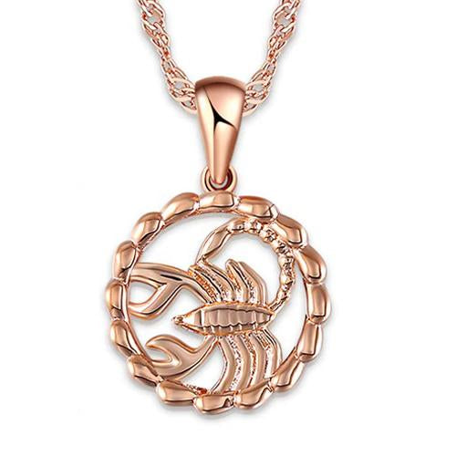The Oracle Necklace - A super delicate rose gold pendant featuring various stylised representations of astrological star signs, suspended on a slim spiral chain necklace.
