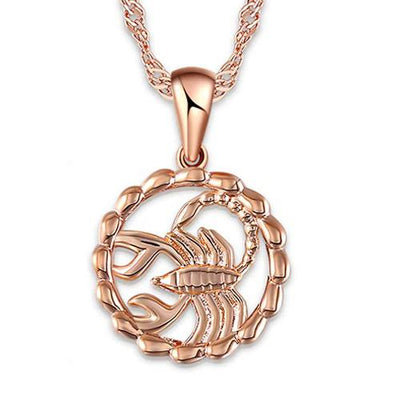 The Oracle Necklace - A super delicate rose gold pendant featuring various stylised representations of astrological star signs, suspended on a slim spiral chain necklace.