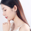 Renee Tassel Chain Lever Back Earrings - Small bejewelled huggies with long draping loops of chain attached to the bottom.