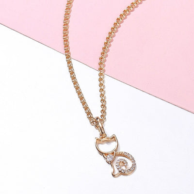 Rosemarie Necklace - A lovely rose gold necklace with a stylised cat pendant, studded with quartz crystals.