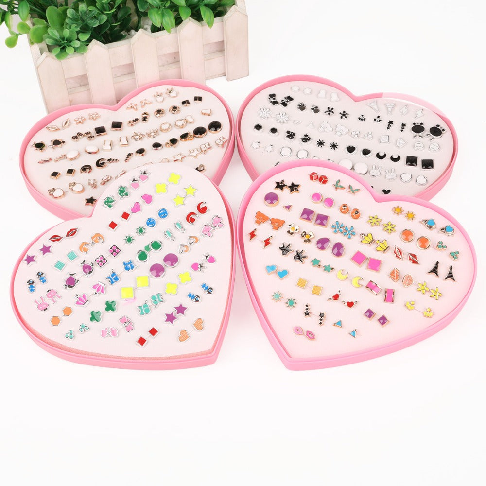 The Sassy Fash Children's Earring Sets - an assortment of silicone-stemmed hypoallergenic earrings in a cute heart-shaped box.