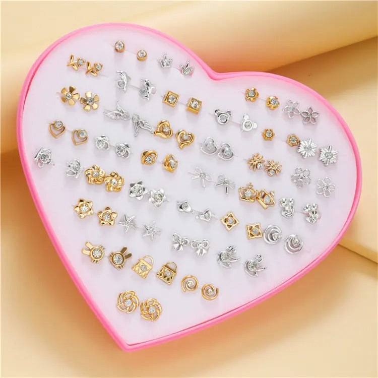 The Sassy Fash Children's Earring Set - an assortment of silicone-stemmed hypoallergenic earrings in a cute heart-shaped box.