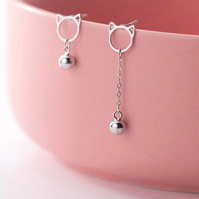 Tinklebell Silver Cat Bell & Tassel Earrings - A pair of simple silver earrings with a cat-shaped charm at the lobe, and a short length of silver chain with a bell on the end.