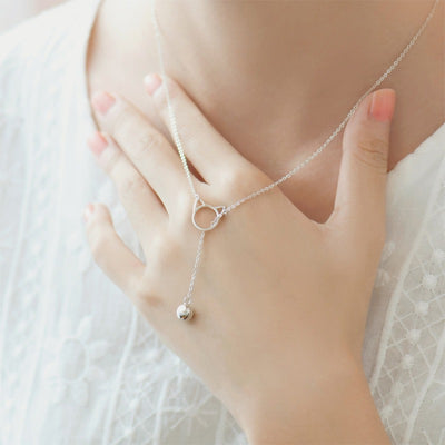 Tinklebell Silver Cat Bell Necklace - A very delicate silver chain necklace with a cat-head charm and a small bell attached to it.