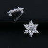 Winter Sparkle Brooch - A tiny little lapel pin made from delicate quartz crystals arranged into a snowflake pattern.