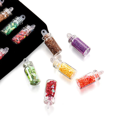 Cheeky Crafter Teensy Sparkler 48 Piece Glitter Art Kit - An assortment of tiny jars containing different types of glitter and fillers.