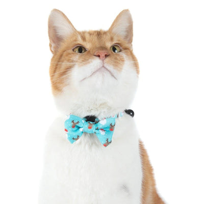 Little Kitty Co. Cat Collar & Bow Tie - Santa's Reindeers (Limited Edition) - An adorable cat collar with a cyan/teal background, decorated with little cartoon reindeer and images of Santa Claus.