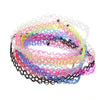 Retro Revival - Fishline Tattoo Choker Singles - A close-up photograph of a stack of tattoo chokers in different colours.