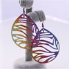 The Dazzle Collection - Zebtacular - UV-treated stainless steel earrings that shine in a rainbow of colours.