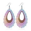 The Dazzle Collection - Escalace - UV treated stainless steel earrings that glow in a rainbow of colours.