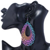 The Dazzle Collection - Escalace - UV treated stainless steel earrings that glow in a rainbow of colours.