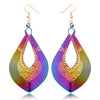 The Dazzle Collection - Arrowlicious - Huge round UV treated stainless steel earrings that glow in a rainbow of colours.