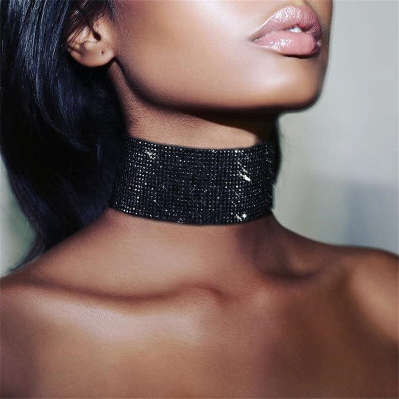 The Diva Drape Choker - A simple close-fitting necklace made of metal sequin mesh, available in gold, silver, or obsidian (black), and available in ether 25mm tall or 40mm tall.