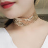 The Diva Drape Choker - A simple close-fitting necklace made of metal sequin mesh, available in gold, silver, or obsidian (black), and available in ether 25mm tall or 40mm tall.