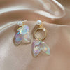 Pearlescent Mermaid Asymmetrical Earrings - Lovely lopsided iridescent earrings with a seaside theme.