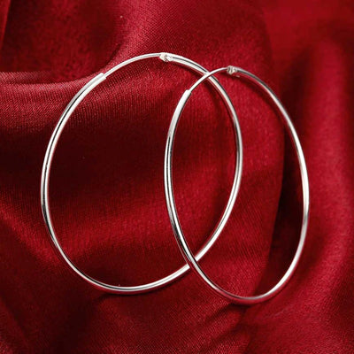Essentials 925 Sterling Silver Hoop Earrings - Beautiful sterling silver hoop earrings, available in your choice of sizes.  Available in:  10mm, 15mm, 20mm, 30mm, 40mm, 50mm, and 70mm. Snag a shiny silver bargain!