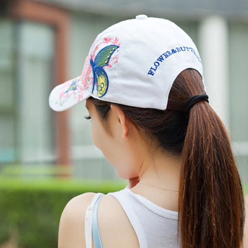 Butterfly Keeper Baseball Cap - An adorable adult baseball cap with a cute butterfly print, available in black, blue, pink, and white.