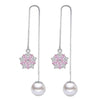 Asuka Cherry Blossom Stud Earrings - Small, delicate crystal earrings shaped like little flowers.