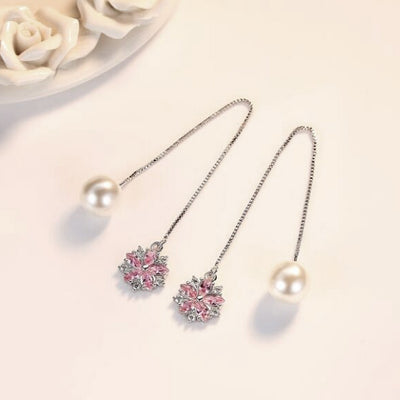 Asuka Cherry Blossom Stud Earrings - Small, delicate crystal earrings shaped like little flowers.