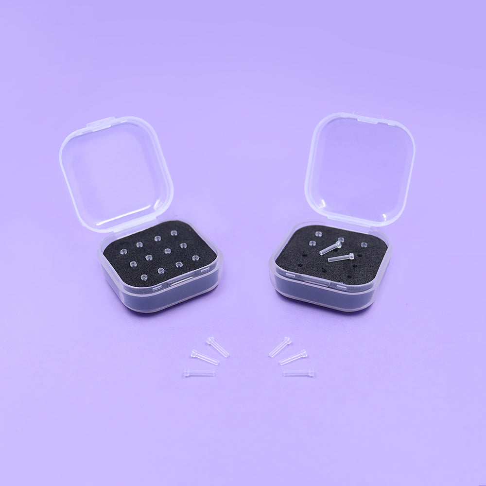 The Safe Keeping Hypoallergenic Anti-Allergy Silicone Earring Post Cover Mini Kits - A cute plastic container with an EVA foam liner, that contains twelve individual silicone earring post covers.