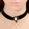Assorted velvet chokers in three different designs.