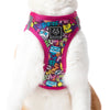 Little Kitty Co. Cat Step-In Harness - Graffiti (Limited Edition) - A brightly coloured cat harness with a hot pink mesh lining, and a colourful outer layer. The print includes an assortment of cute cartoon cats, food, and pop-art style words.