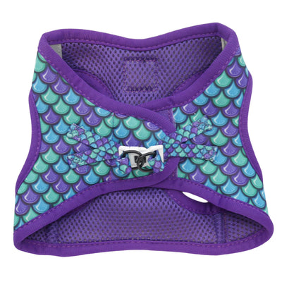 Little Kitty Co. Cat Step-In Harness - Scaled Back (Limited Edition) - A full chest cat harness with a fun mermaid or fish scale print. It has purple mesh lining and purple trim, but the print itself is a tasteful mixture of purple, blue, and green.