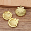 Lovely Lockets - Shell - A cute little clamshell shaped locket available in various shades of gold and silver.